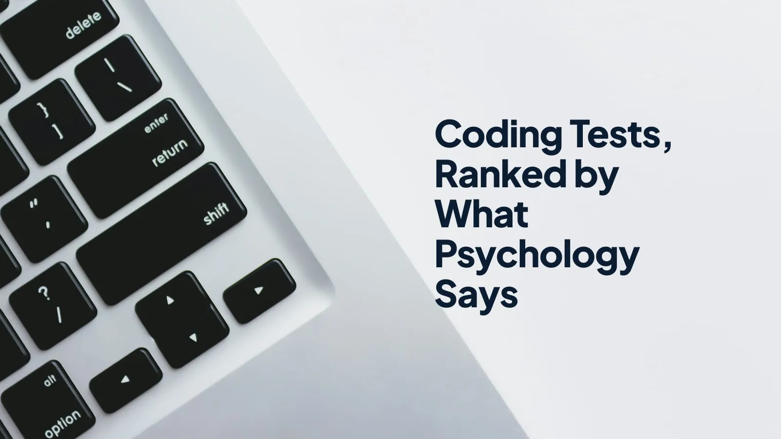 A close-up of a laptop keyboard on a white surface, next to the headline "Coding Tests, Ranked by What Psychology Says"