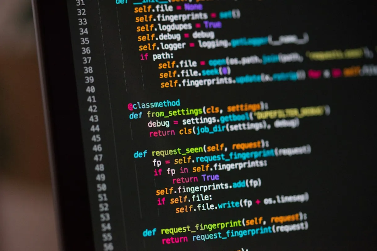 Python code displayed on a dark monitor